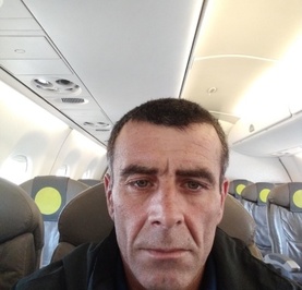 Али