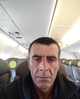 Али